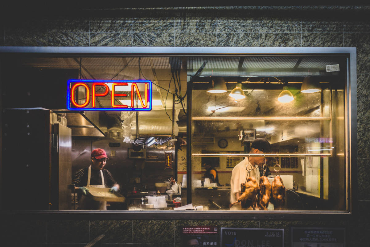 Image of open sign on the front of a chicken restaurant